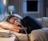 Person sleeping peacefully at night wearing a CPAP mask in a softly lit bedroom