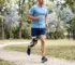 Athlete wearing a knee brace for support while running outdoors