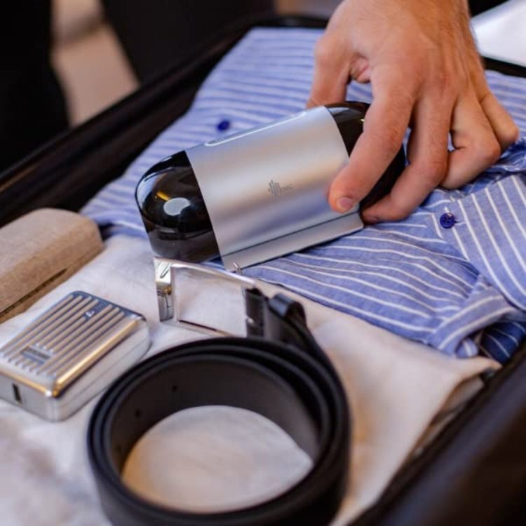 Business traveller packing the Mini Travel CPAP Machine into its carry case